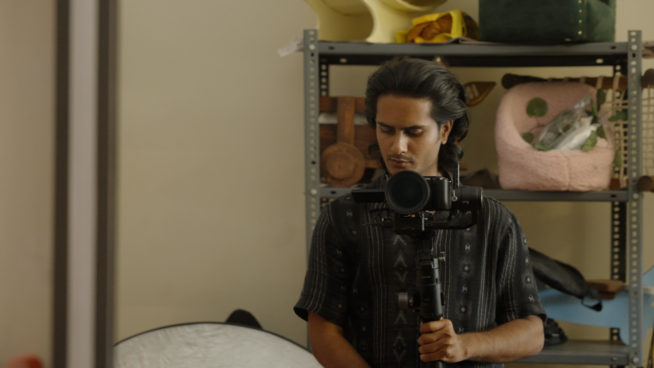 Barath Ram filming with a camera and stabilizer